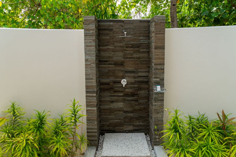 Shower with Natural Stone Wall Finish